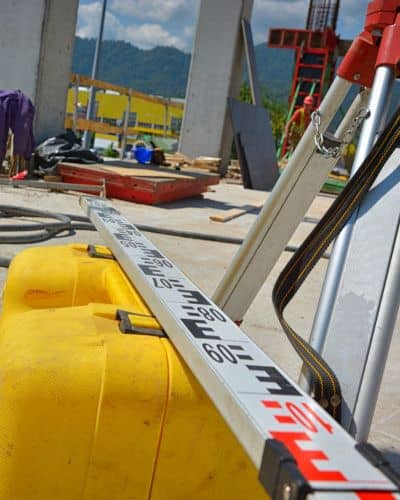 Surveying equipment used for an ALTA Survey on a developing construction site