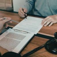 Lender reviewing documents during approval process supported by an ALTA title survey