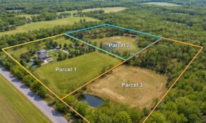 Aerial property multiple parcels boundary lines - ALTA SURVEY Idaho Aerial view of a single property divided into multiple parcels with visible boundary lines, showing how an alta survey applies to land with separate legal descriptions